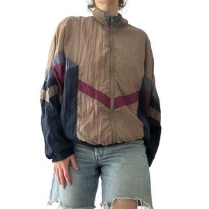 Classic 90s tracksuit jacket. Super lightweight, with cotton lining